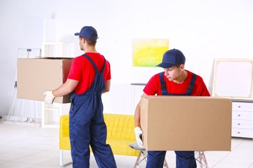 Removal team preparing moving boxes in West Hampstead