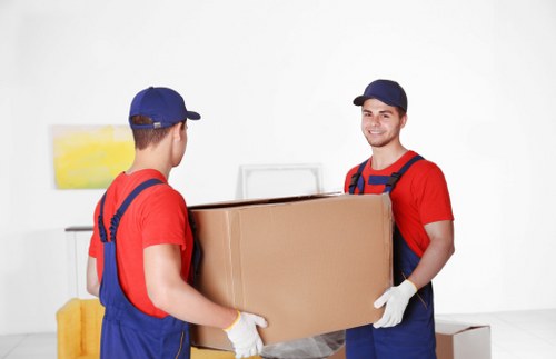 Removal team preparing items for a house move