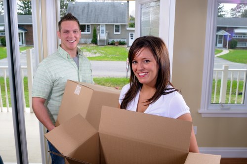 Unpacking boxes into a new West Hampstead home