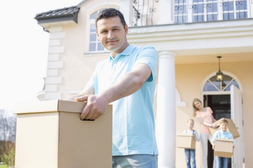 Professional movers handling apartment access and stairs in West Hampstead