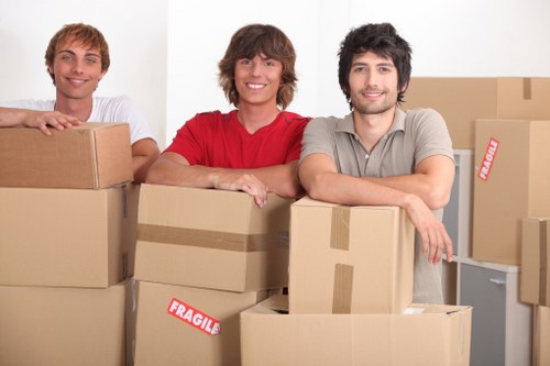 Removal specialists in Westhampstead discussing public liability insurance and careful handling
