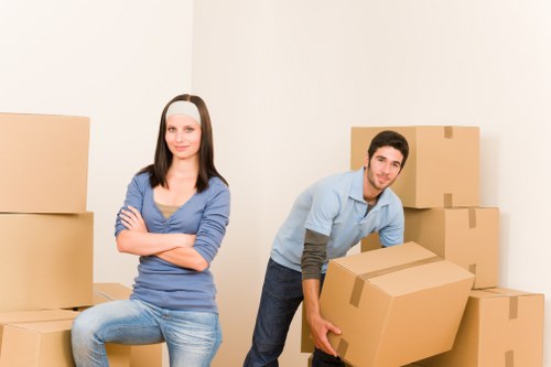 Packed boxes and furniture ready for removals van collection in West Hampstead