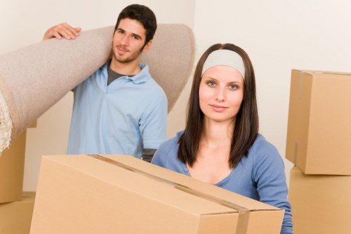 Packing and loading belongings into a van for a West Hampstead move